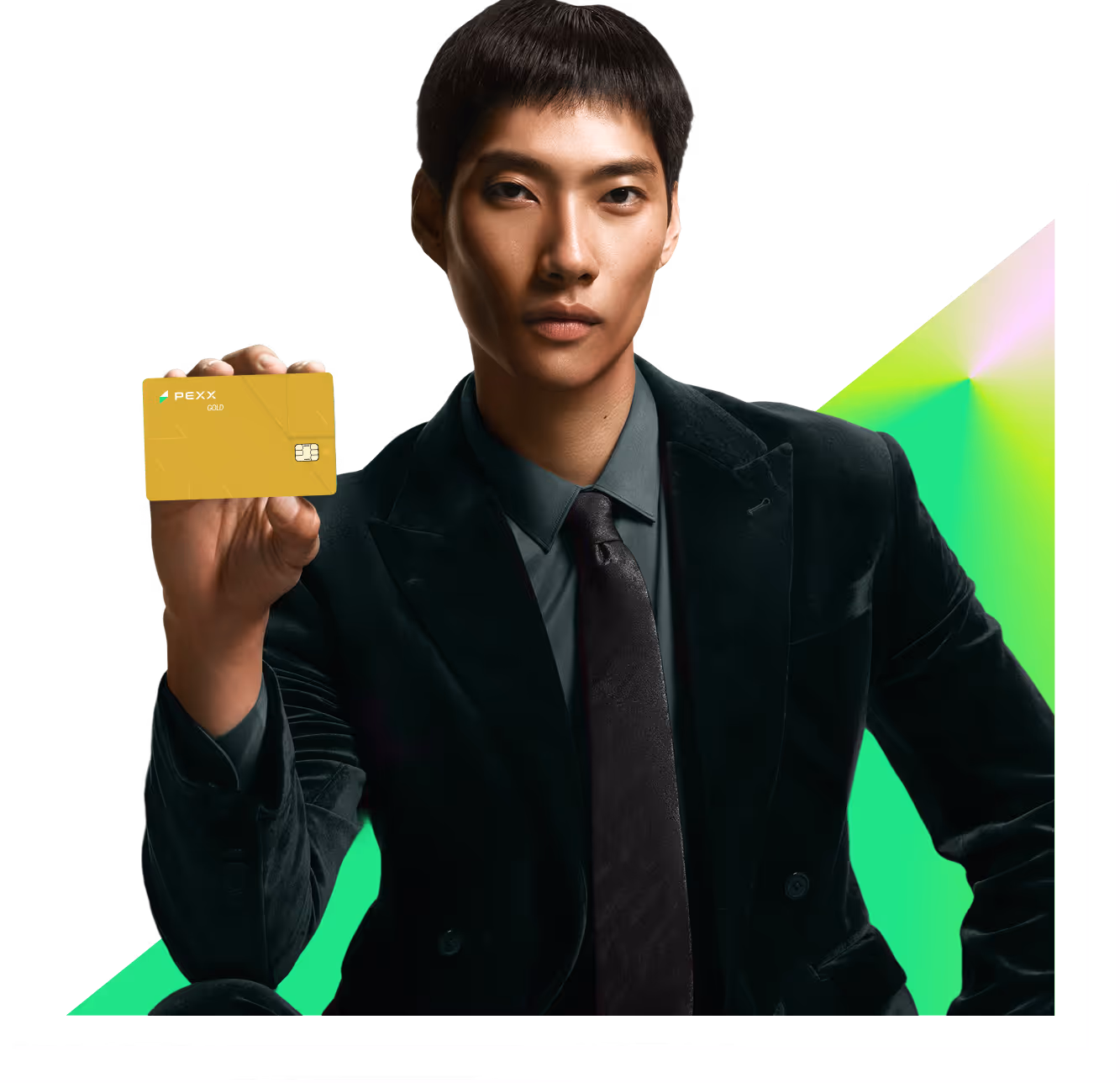 Man in a dark suit holding a gold PEXX Visa credit card against a dark background with green and yellow geometric light effects.